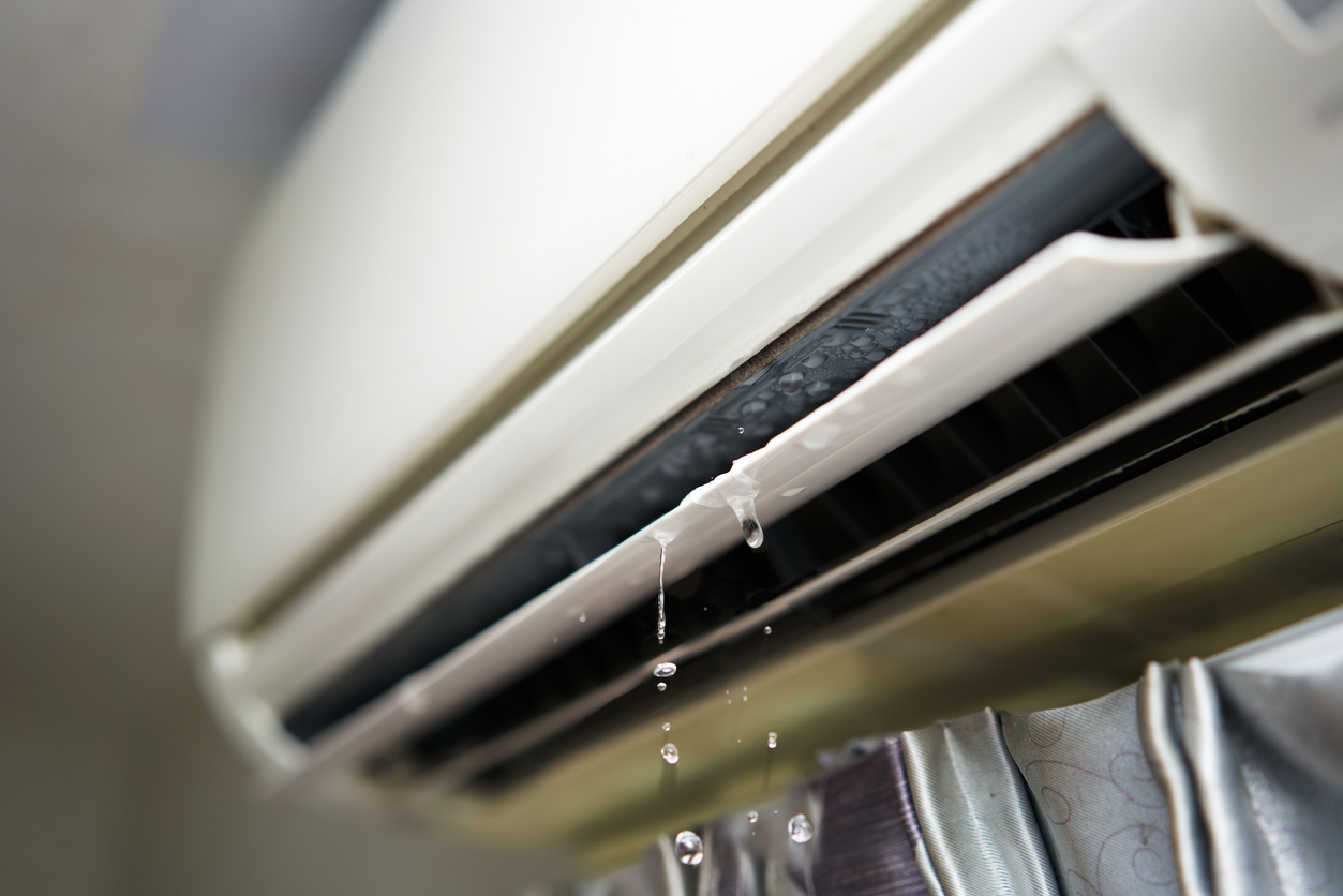 Water dripping out of an AC unit
