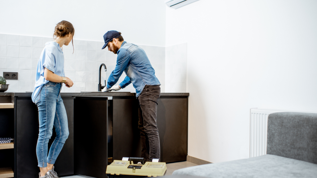Faucet being replaced by a plumber